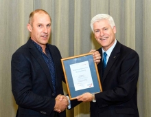 Jason reciving award from MP Tim Macindoe